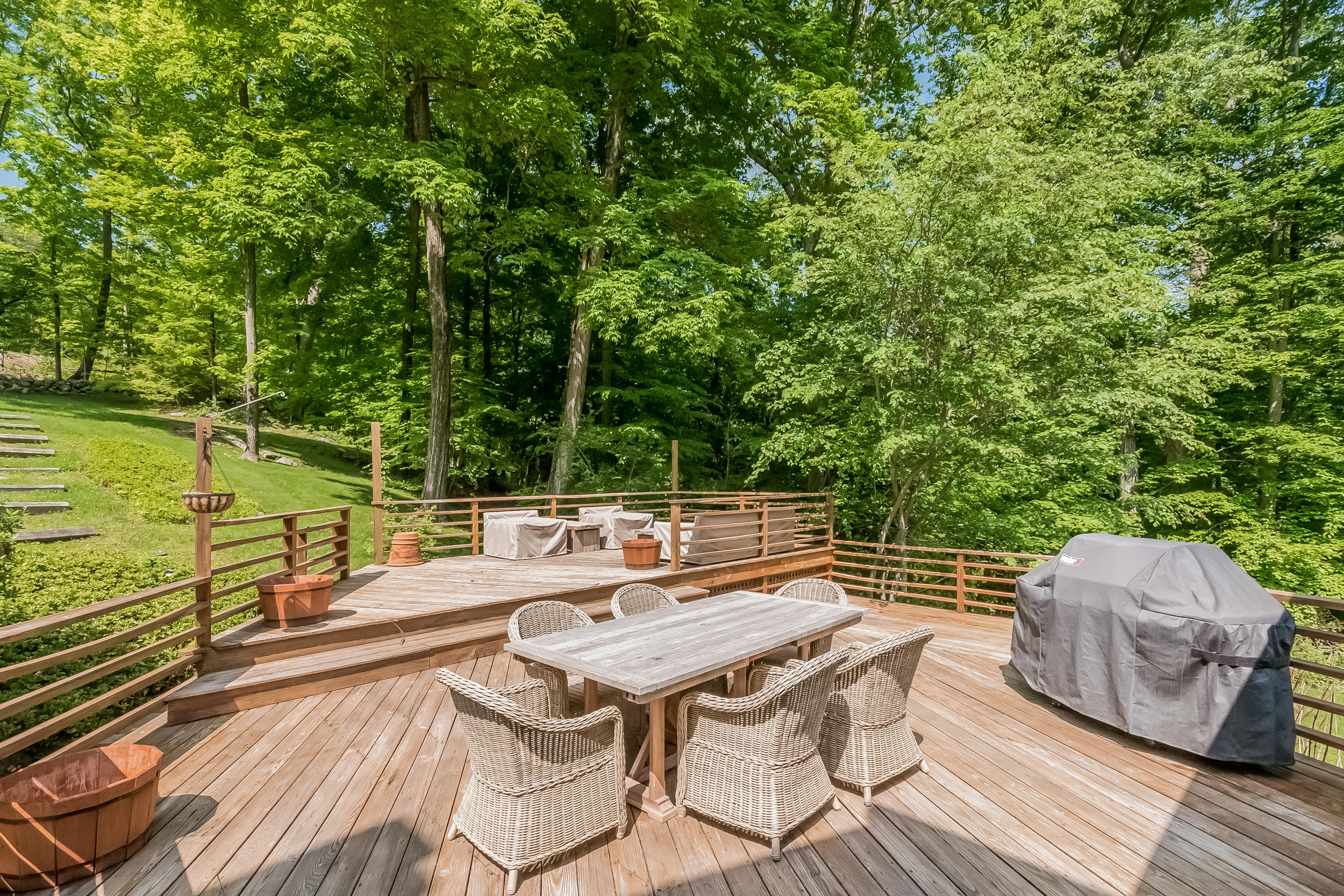 103 Salem Road New Canaan, CT 06840 - Photo 35 of 42 a view of a chairs and table on the wooden floor