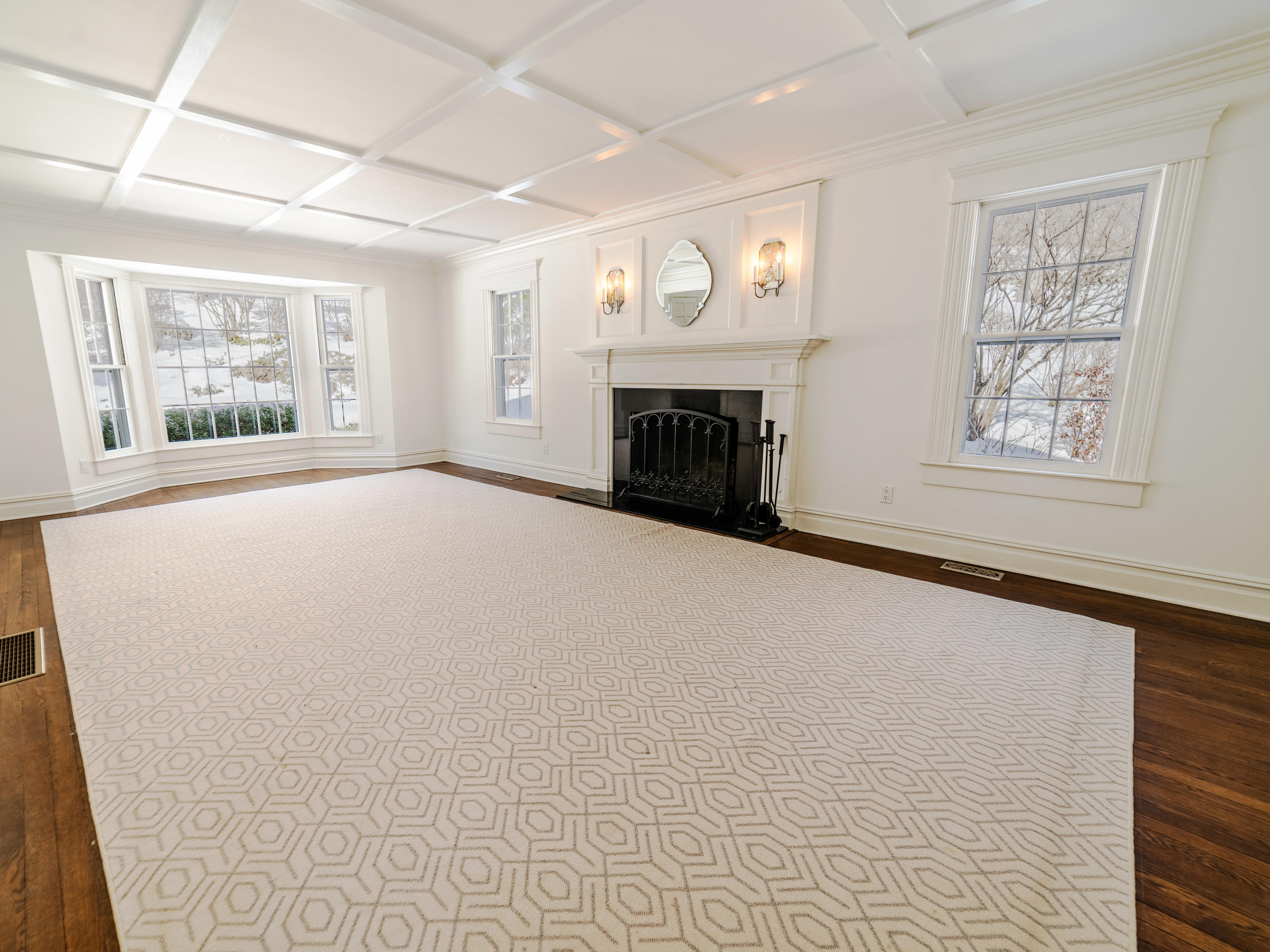 103 Salem Road New Canaan, CT 06840 - Photo 8 of 42 an empty room with windows and fireplace