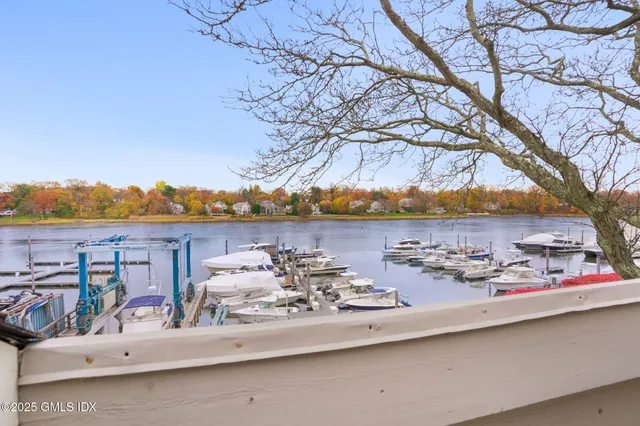 a terrace with outdoor seating and city view