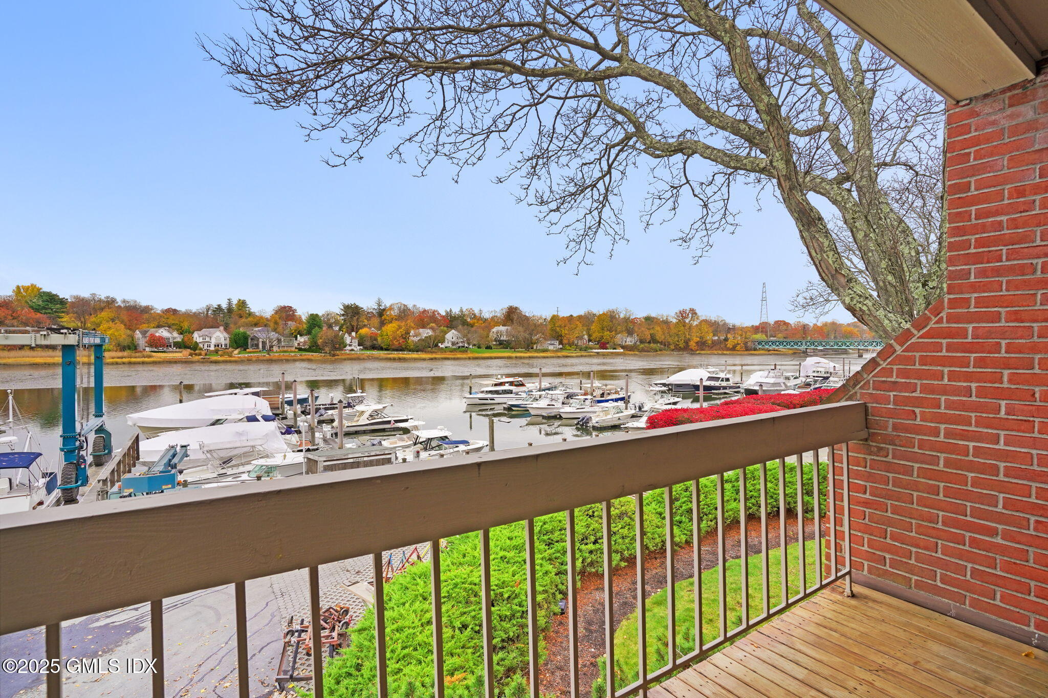 7 River Road, Unit 310 Cos Cob, CT 06807 - Photo 17 of 19 a city view from a balcony with outdoor space