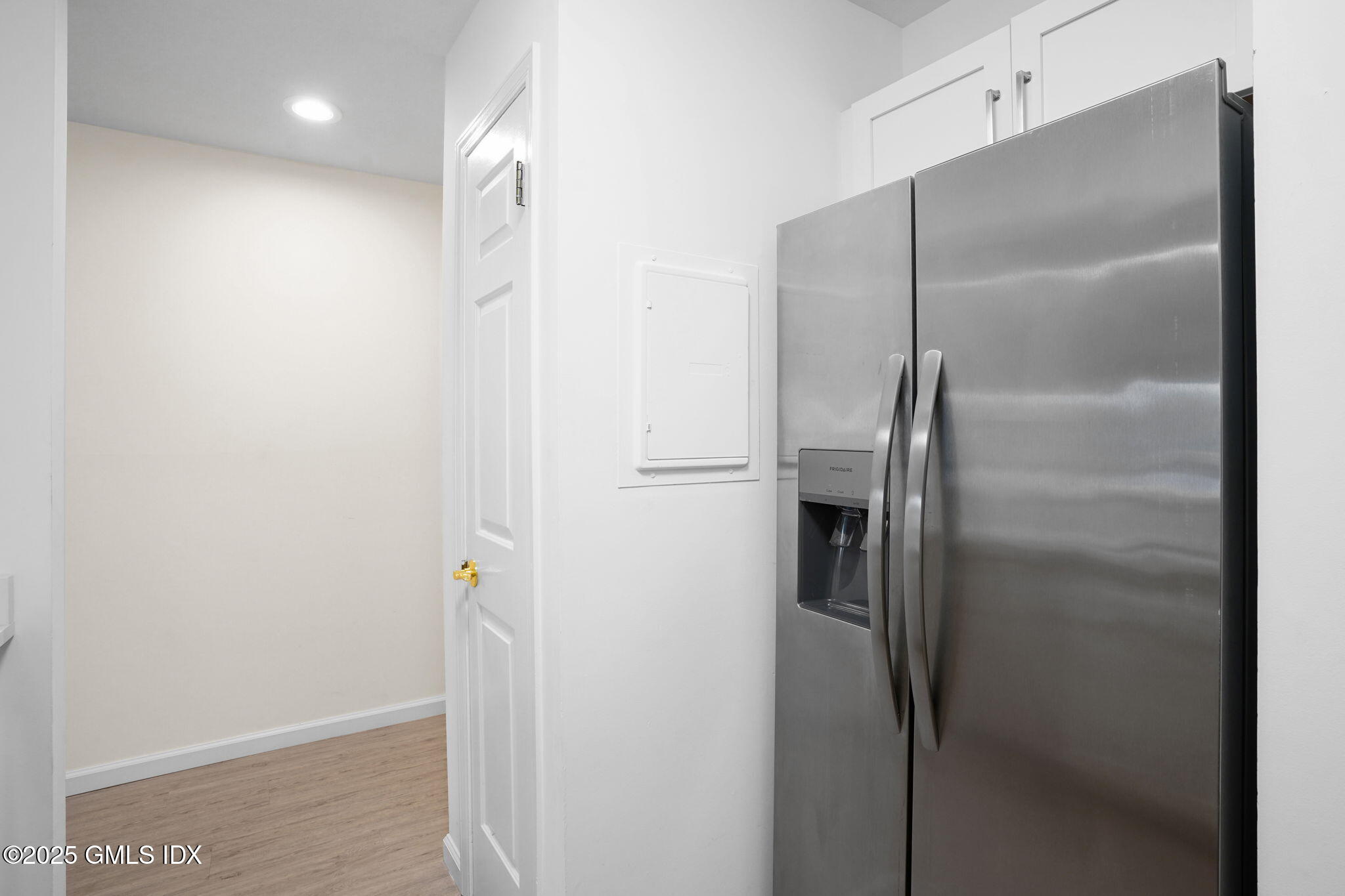 7 River Road, Unit 310 Cos Cob, CT 06807 - Photo 6 of 19 a bathroom with a glass shower door