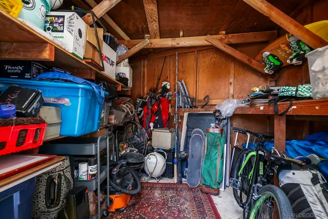 a view of a house with a snow in the background
