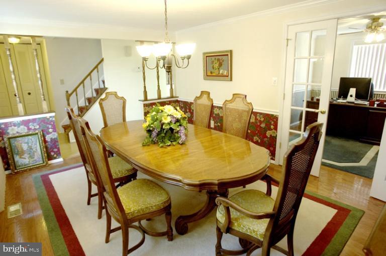 20700 Bell Bluff Road Gaithersburg, MD 20882 - Photo 5 of 30 Dining Room is open to foyer and den.