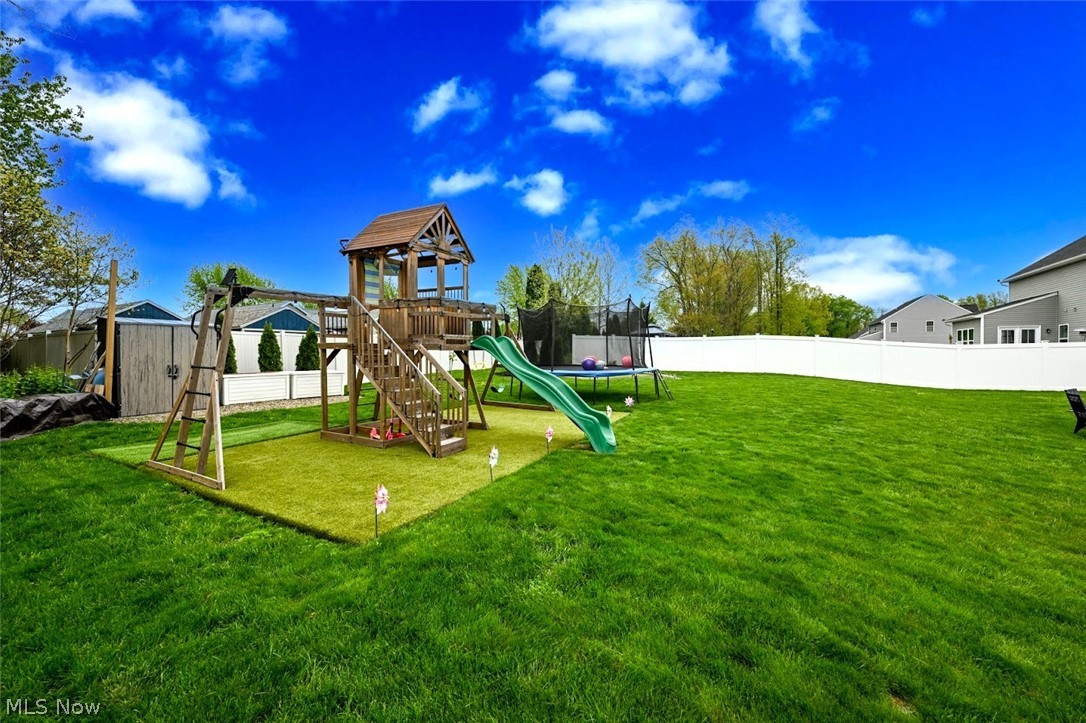 3021 Stonehurst Road Uniontown, OH 44685 - Photo 4 of 48 *TURF INSTALLED W/PLAYGROUND ~