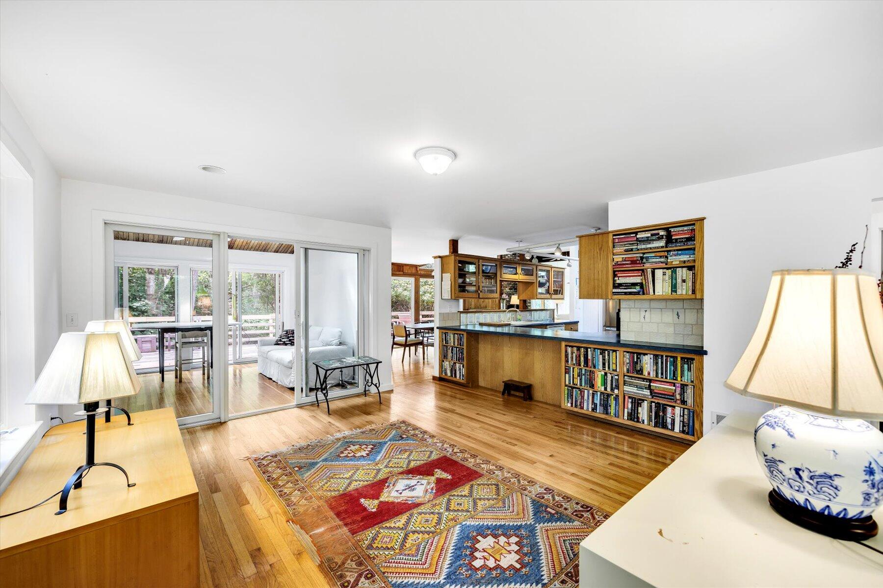 44 Nobska Road Woods Hole, MA 02543 - Photo 20 of 47 a living room with furniture a flat screen tv and a table