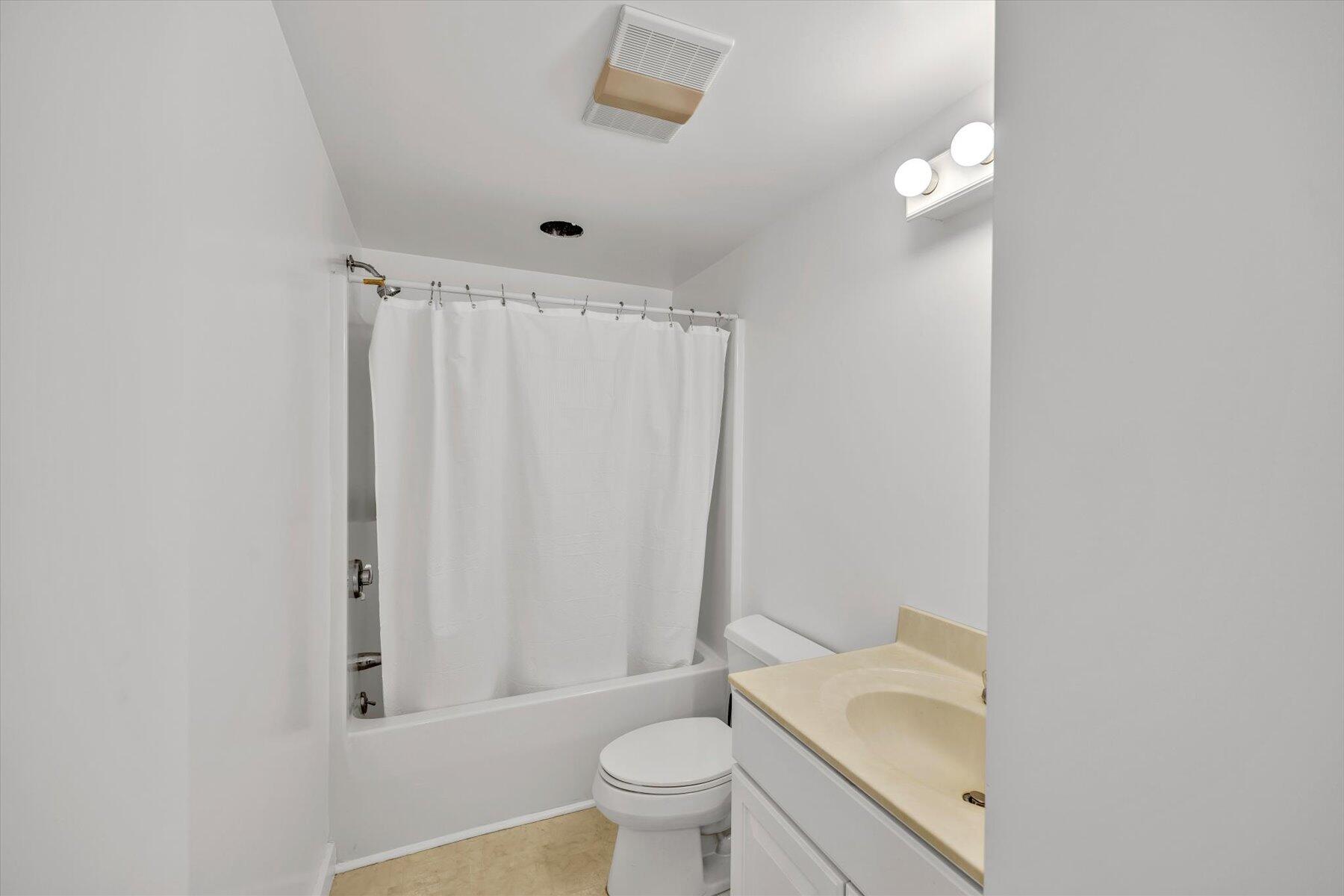 44 Nobska Road Woods Hole, MA 02543 - Photo 24 of 47 a bathroom with a sink toilet and shower