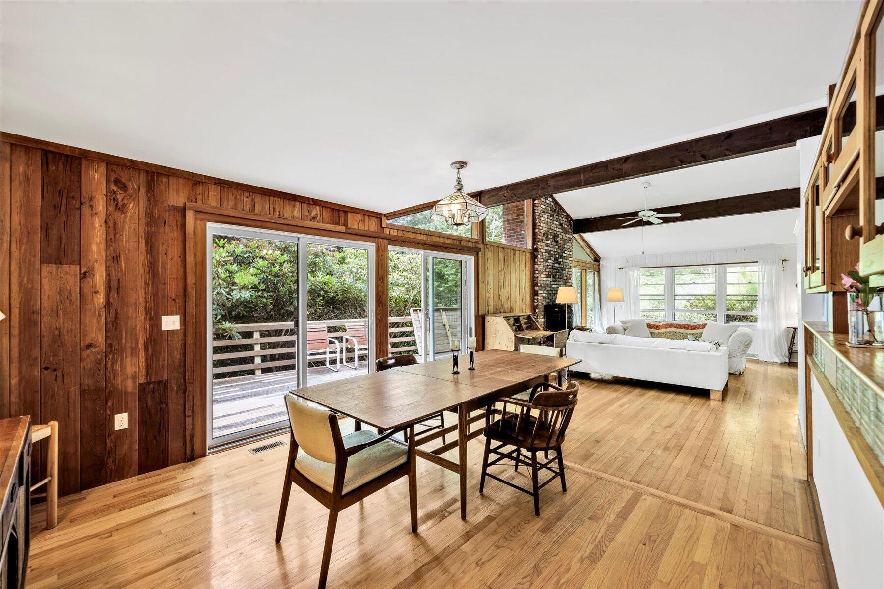 44 Nobska Road Woods Hole, MA 02543 - Photo 28 of 47 a dining room with furniture and large windows