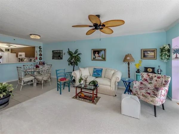 an aerial view of a residential houses with outdoor space