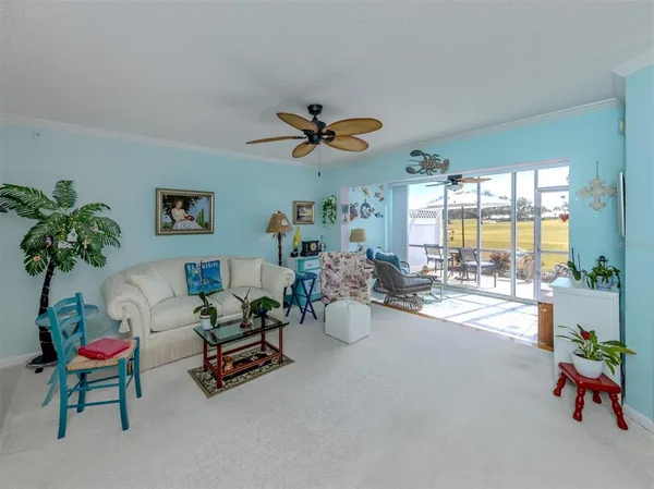 a kitchen with stainless steel appliances a refrigerator sink and microwave