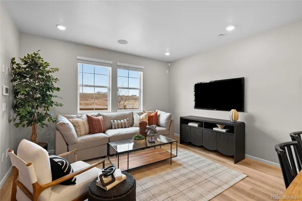 a bathroom with a sink toilet tub and shower