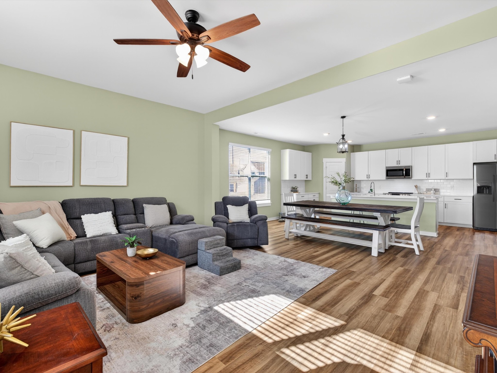 145 Southwind Run Spring Hill, TN 37174 - Photo 17 of 62 a living room with furniture a ceiling fan and a rug