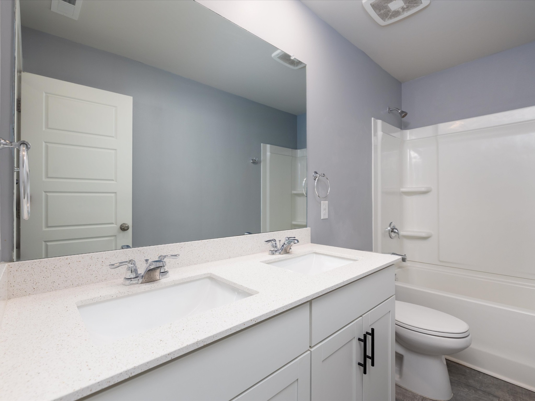 145 Southwind Run Spring Hill, TN 37174 - Photo 42 of 62 a bathroom with a sink a toilet and shower