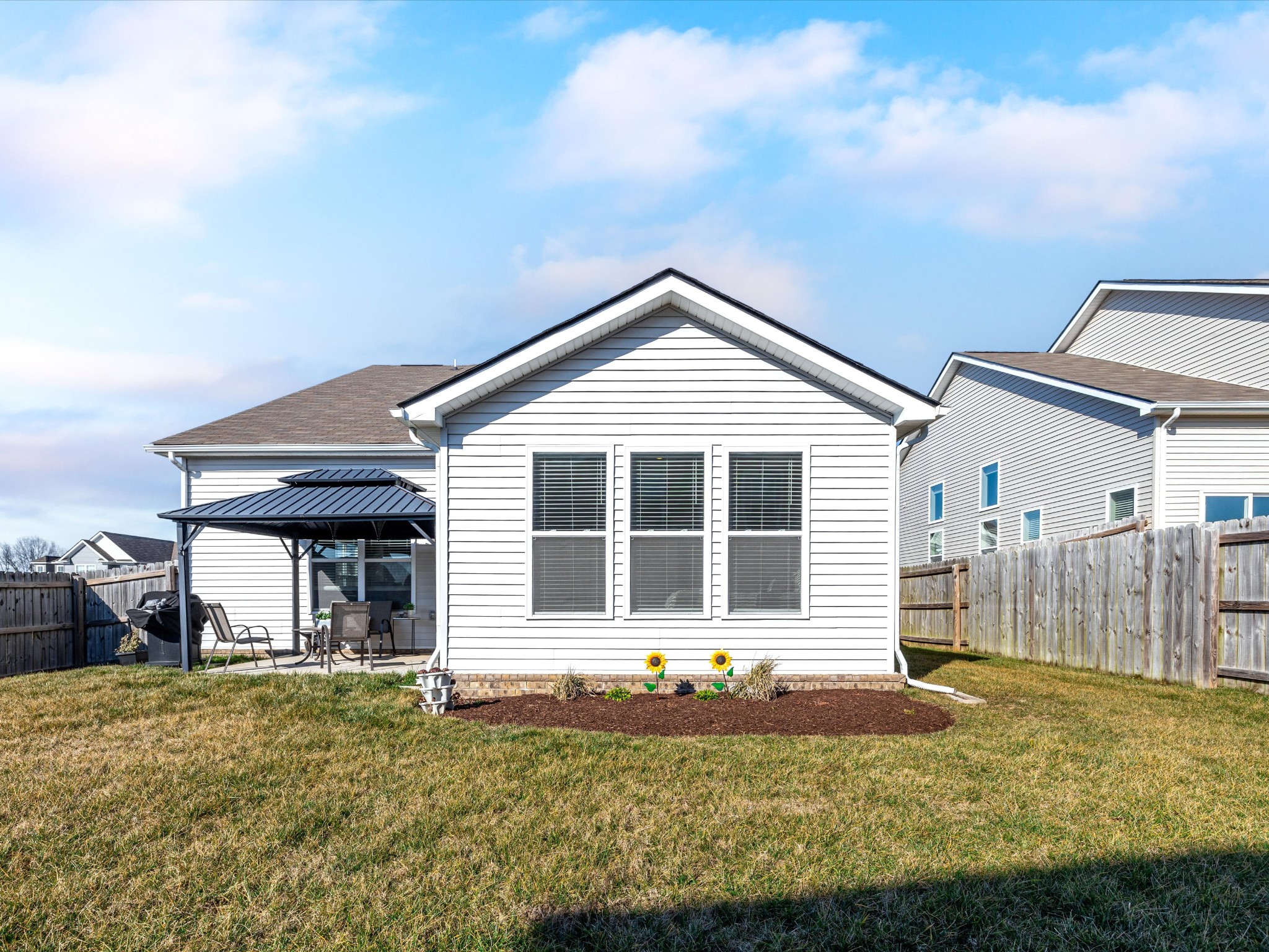 145 Southwind Run Spring Hill, TN 37174 - Photo 53 of 62 a front view of a house with a yard