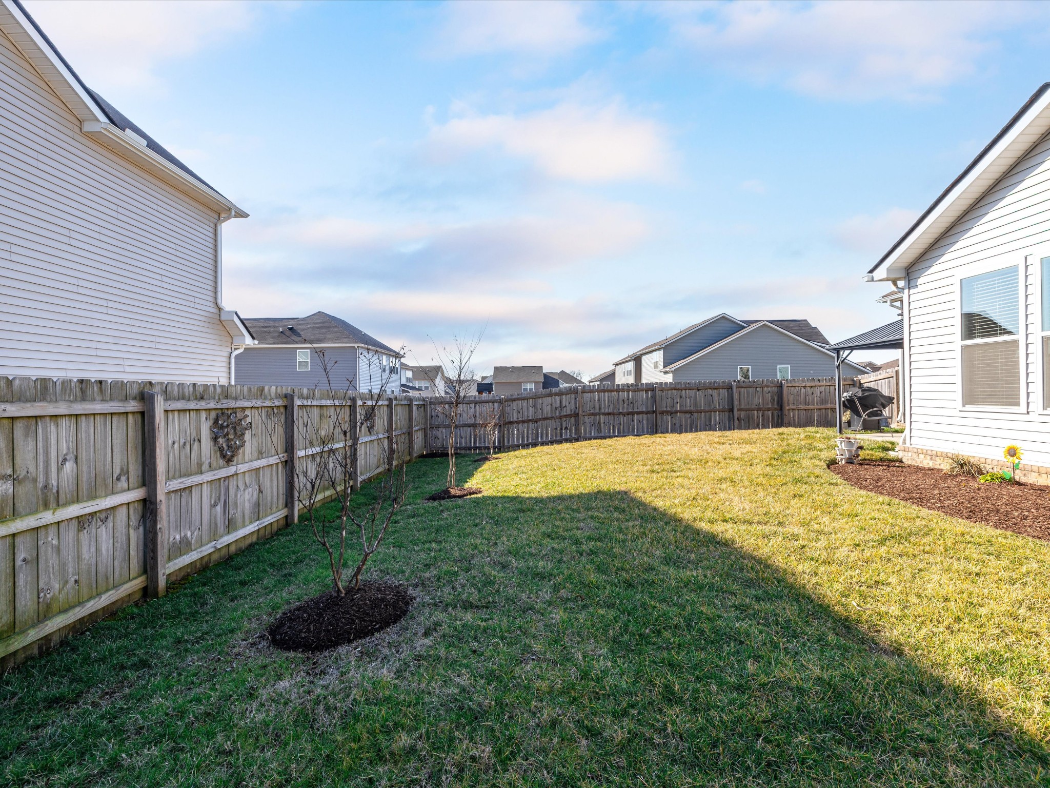 145 Southwind Run Spring Hill, TN 37174 - Photo 56 of 62 a view of residential houses with yard and swimming pool