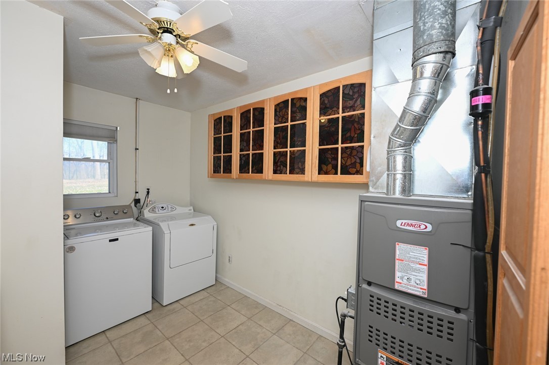 1509 McTaggart Road Stow, OH 44224 - Photo 27 of 30 Utility room with A/C, furnace, Washer/Dryer, storage space