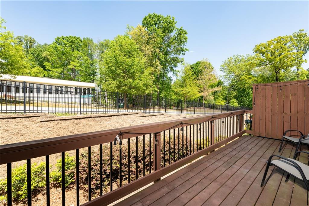 4062 Townsend Lane Atlanta, GA 30346 - Photo 17 of 52 a view of a wooden roof deck