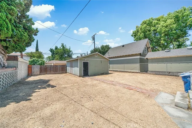 a house view with a backyard space