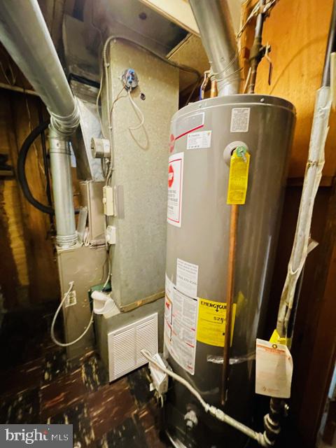 8403 Legation Road New Carrollton, MD 20784 - Photo 48 of 48 FURNACE ROOM AND HOT WATER TANK