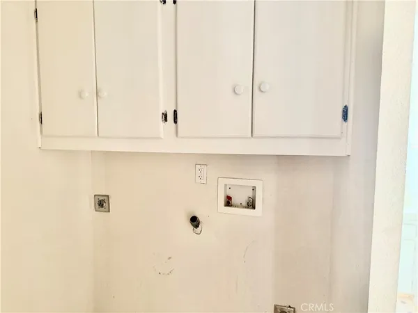 a bathroom with a sink and cabinets