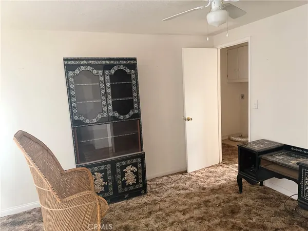 a room with furniture and wooden floor