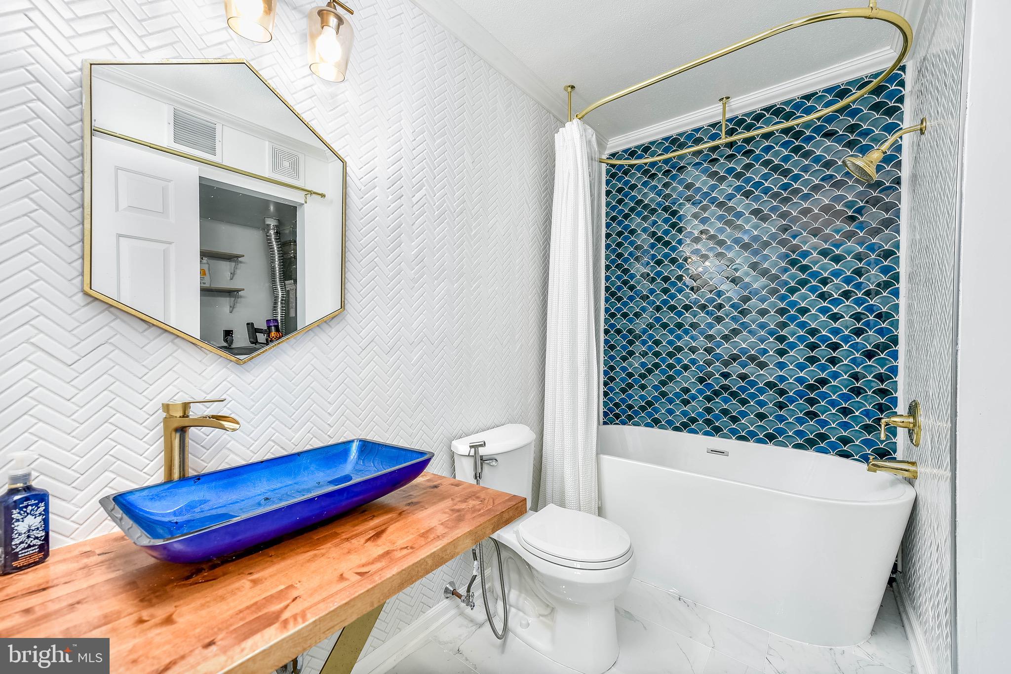 129 Fort Evans Road Southeast, Unit E Leesburg, VA 20175 - Photo 10 of 20 Luxuriously updated modern ensuite bathroom