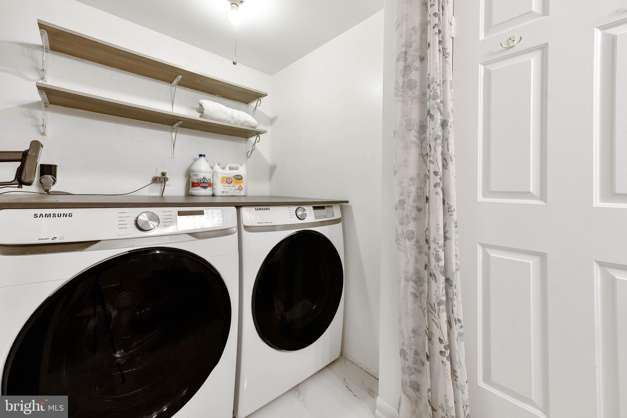 129 Fort Evans Road Southeast, Unit E Leesburg, VA 20175 - Photo 13 of 20 Full size Samsung front load washer and dryer
