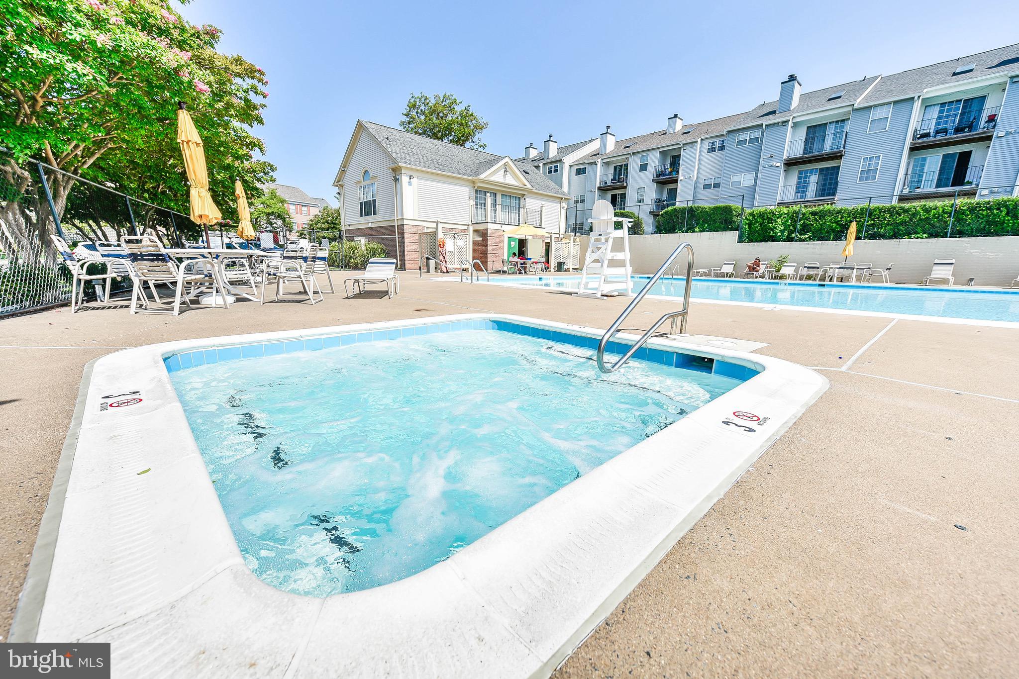 129 Fort Evans Road Southeast, Unit E Leesburg, VA 20175 - Photo 17 of 20 On chillier days, relax in the soothing hot tub
