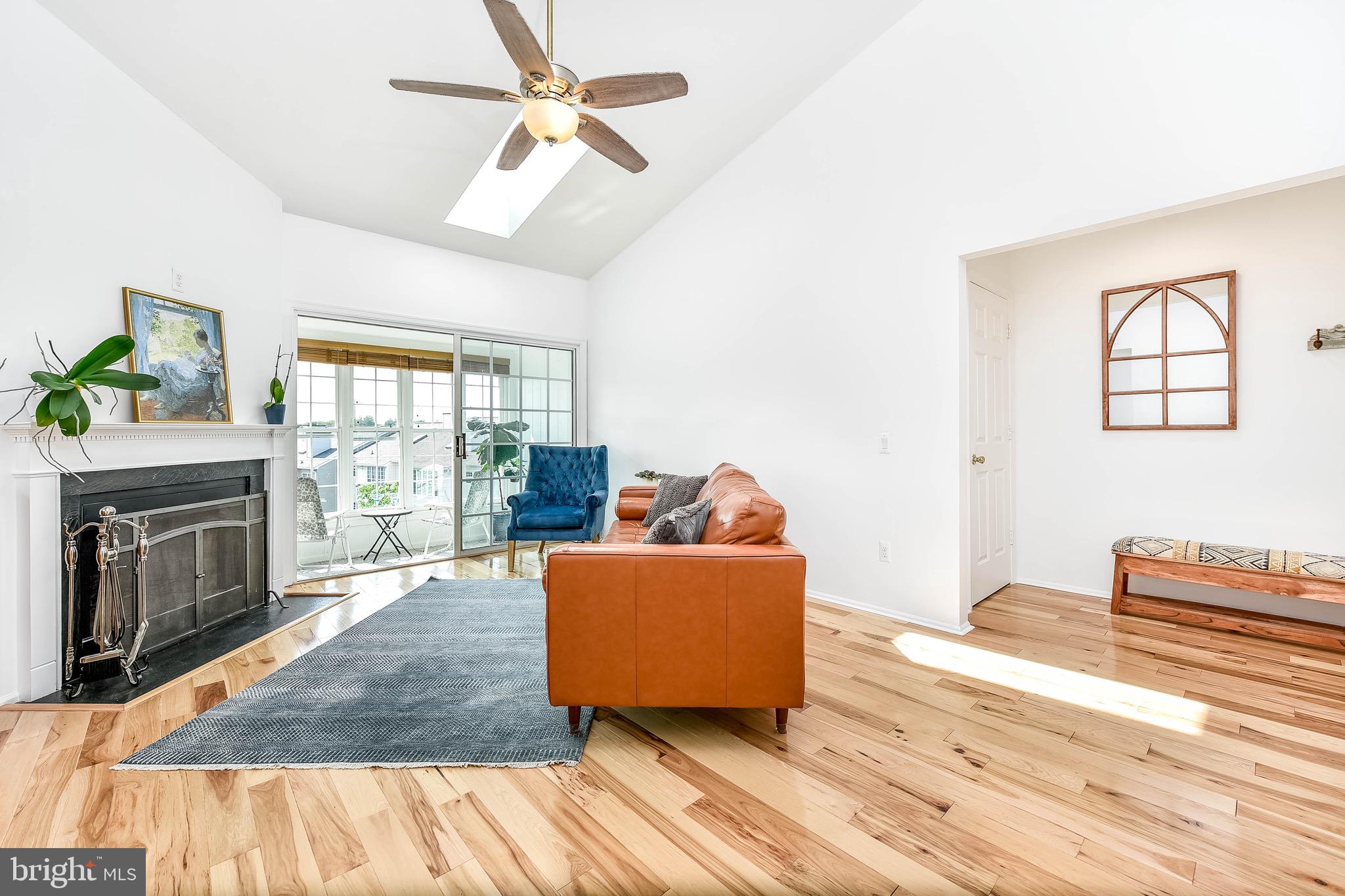 129 Fort Evans Road Southeast, Unit E Leesburg, VA 20175 - Photo 4 of 20 Cozy wood burning fireplace with attractive mantel