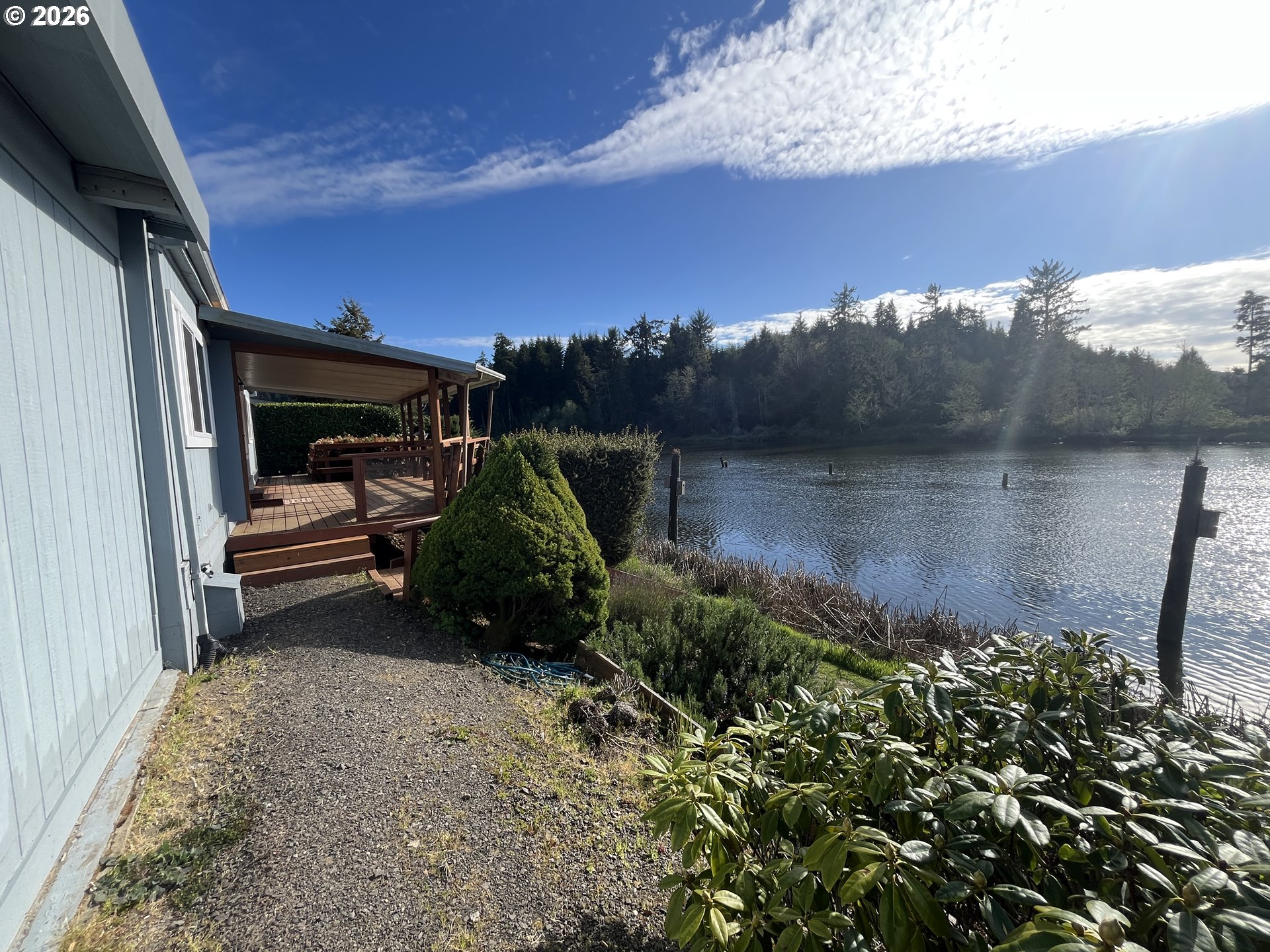 100 River Bend Road, Unit 23 Reedsport, OR 97467 - Photo 38 of 41 a view of a backyard of the house