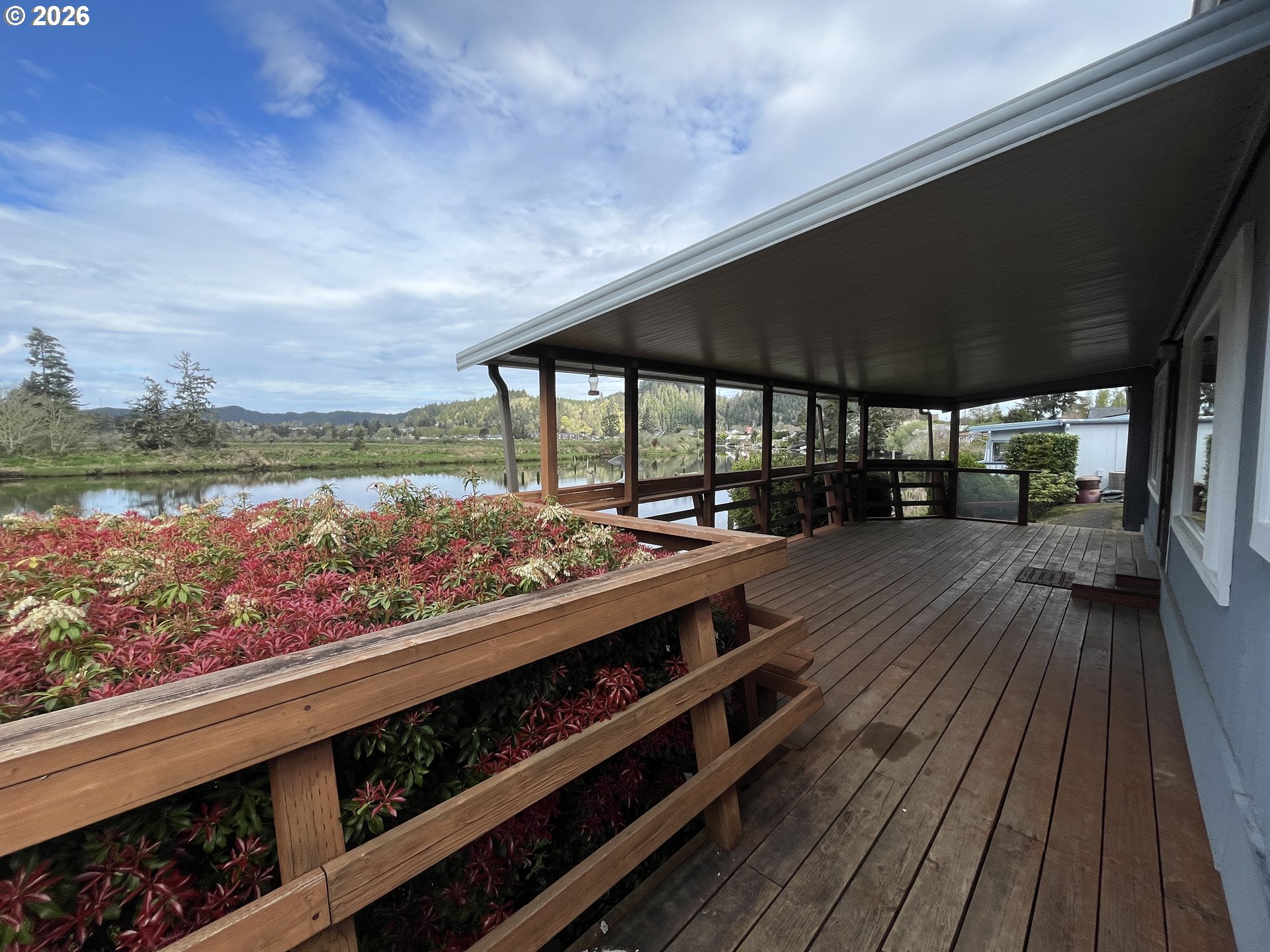 100 River Bend Road, Unit 23 Reedsport, OR 97467 - Photo 41 of 41 a view of a balcony with wooden floor