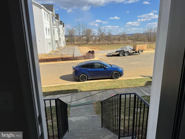 a view of a kitchen from a window