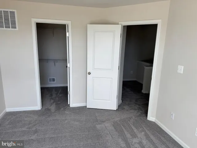 wooden floor and closet in a room
