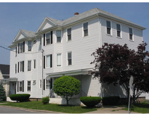 1926 Rodman Street Fall River, MA 02721 - Photo 1 of 1 a front view of a house with a yard