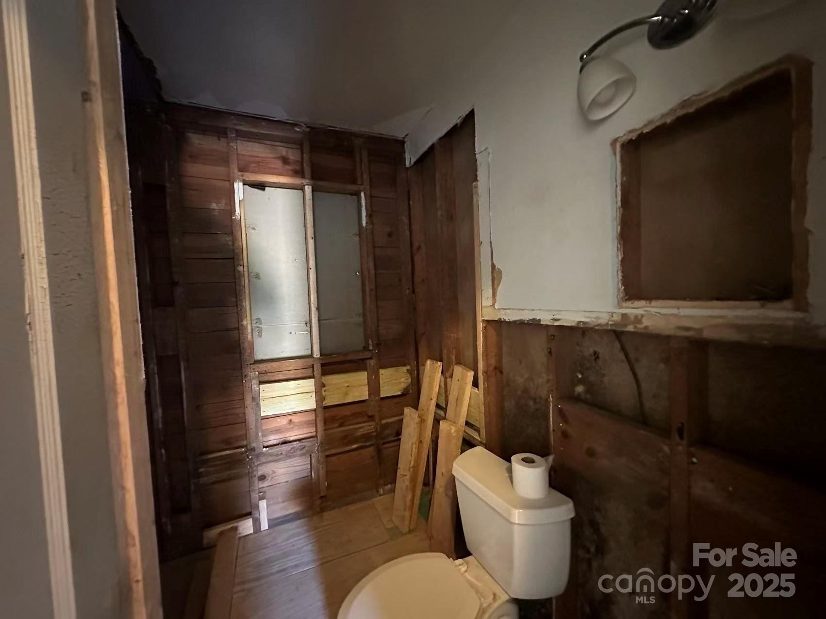 112 East Elliott Street Fort Mill, SC 29715 - Photo 8 of 8 a bathroom with a toilet a sink and mirror