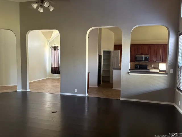 an empty room with shelves