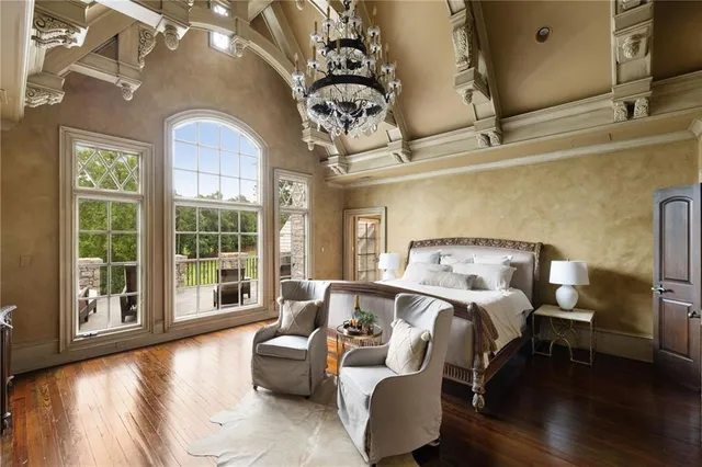 a kitchen with a stove sink and cabinets