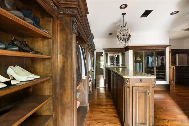 a view of a lake with a house in a background