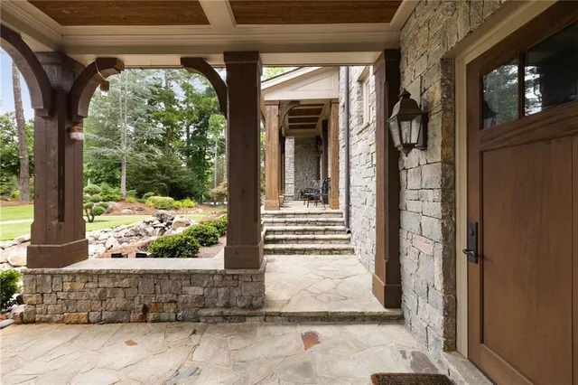 a bed room with a bed and a chandelier