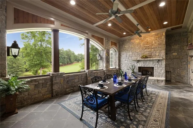 a bedroom with a bed and a refrigerator