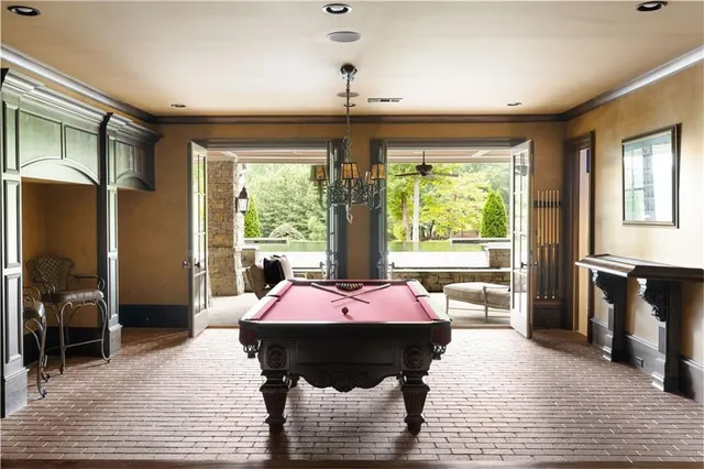 a living room with furniture and a rug