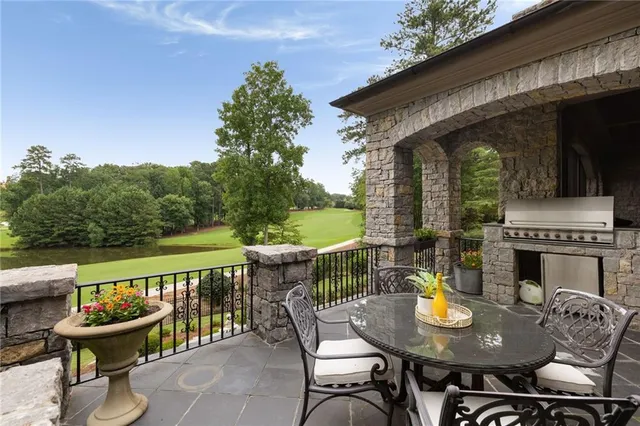 a utility room with sink dryer and washer