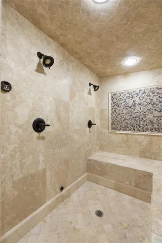 a view of swimming pool with sitting area