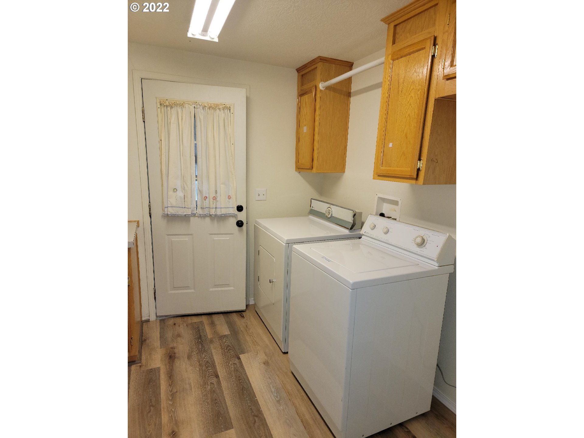 25222 East Welches Road, Unit 8 Welches, OR 97067 - Photo 16 of 31 a utility room with a sink washer and dryer
