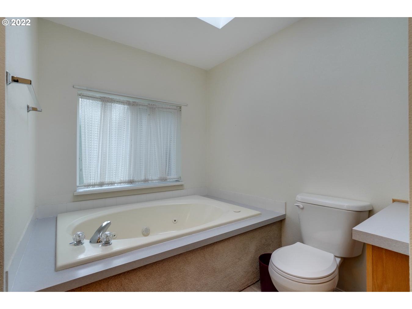 25222 East Welches Road, Unit 8 Welches, OR 97067 - Photo 17 of 31 a bathroom with a sink a toilet and a bathtub
