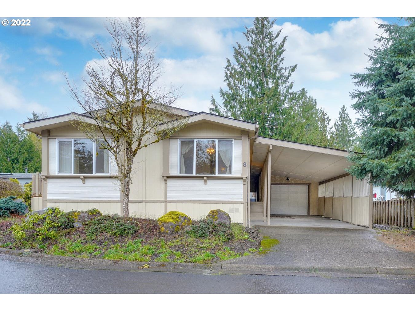 25222 East Welches Road, Unit 8 Welches, OR 97067 - Photo 23 of 31 a front view of a house with a garden