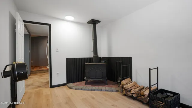 a bedroom with bed and window