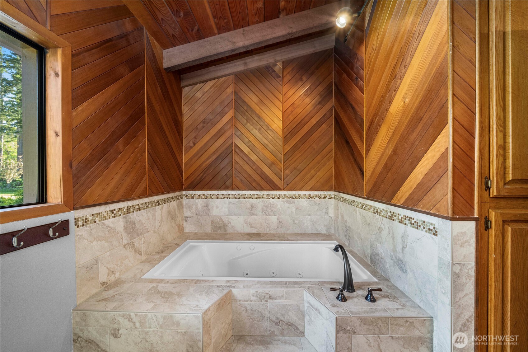 491 Bachelor Road Sequim, WA 98382 - Photo 19 of 39 a bathroom with a bathtub and shower