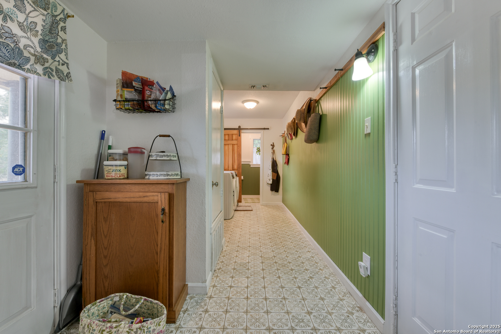 510 Rudeloff Road Seguin, TX 78155 - Photo 24 of 54 a view of a hallway with workspace and a bathroom