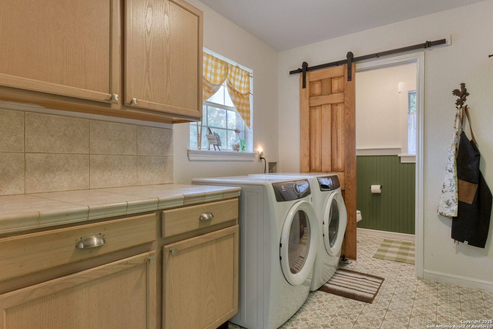 510 Rudeloff Road Seguin, TX 78155 - Photo 25 of 54 a utility room with dryer and washer