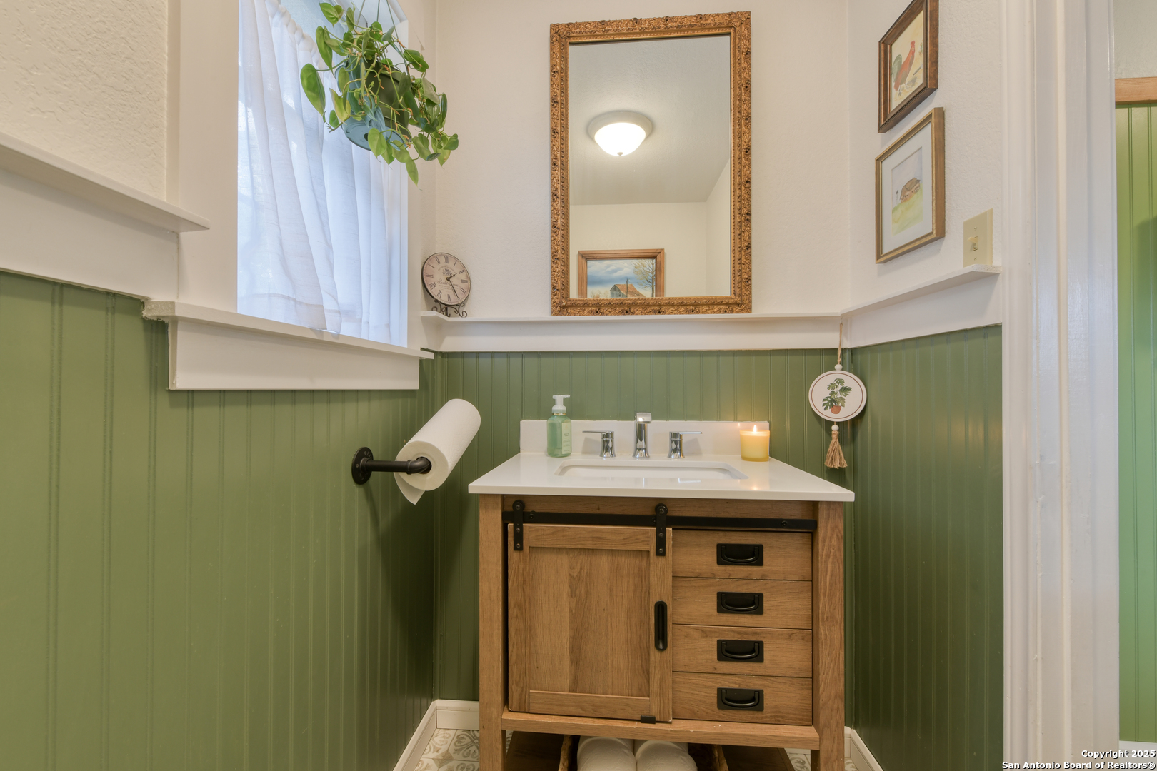 510 Rudeloff Road Seguin, TX 78155 - Photo 26 of 54 a bathroom with a sink a mirror and shower